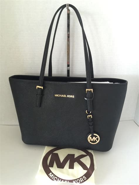 cuanto cuesta una bolsa de michael kors original|carteras Michael Kors precios.